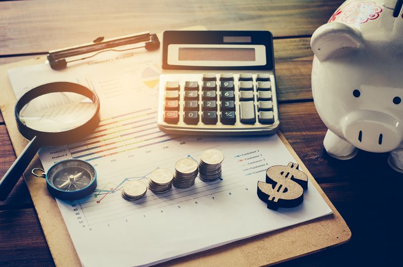 Calculator with piggy bank